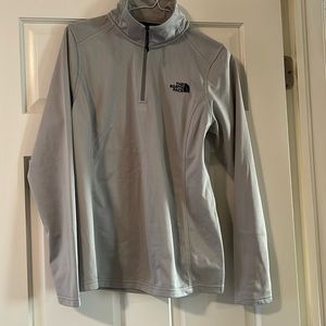 The north face 1/4 zip. Brand new.